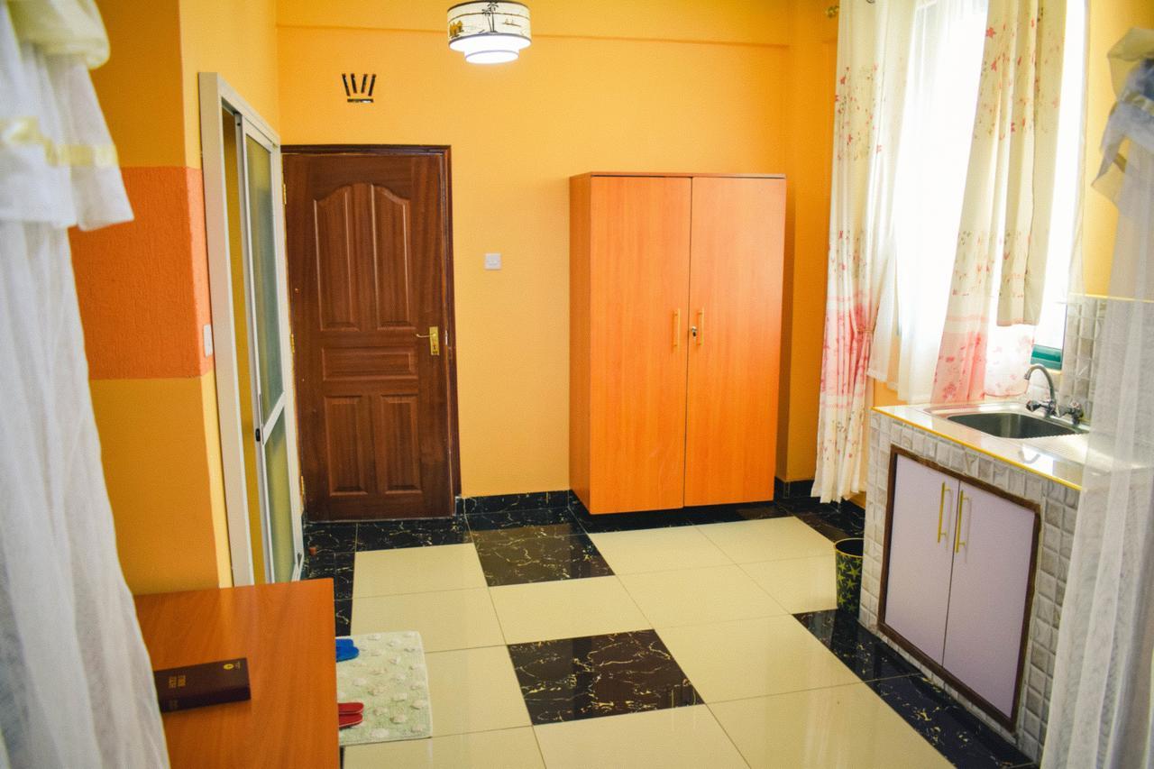 The Joy Hotel Voi Exterior photo
