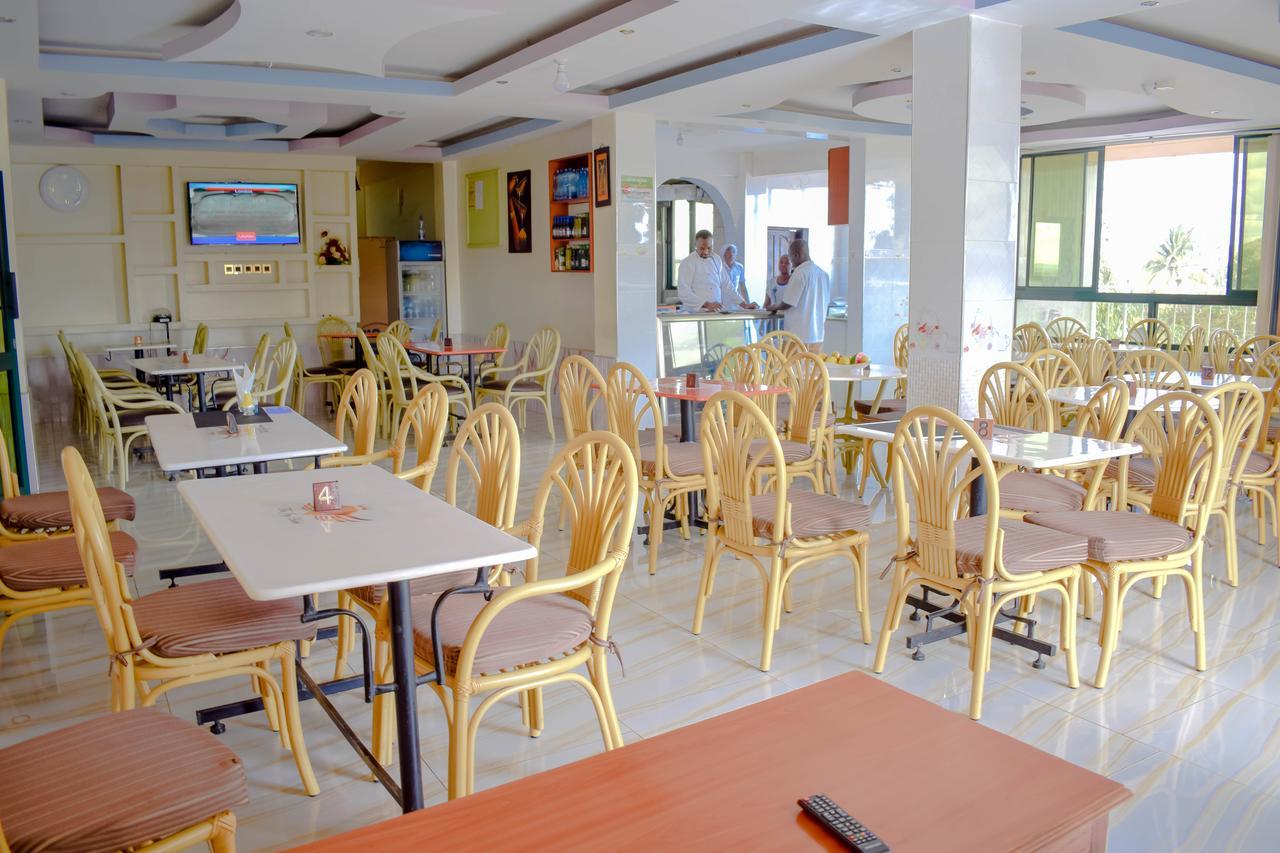 The Joy Hotel Voi Exterior photo