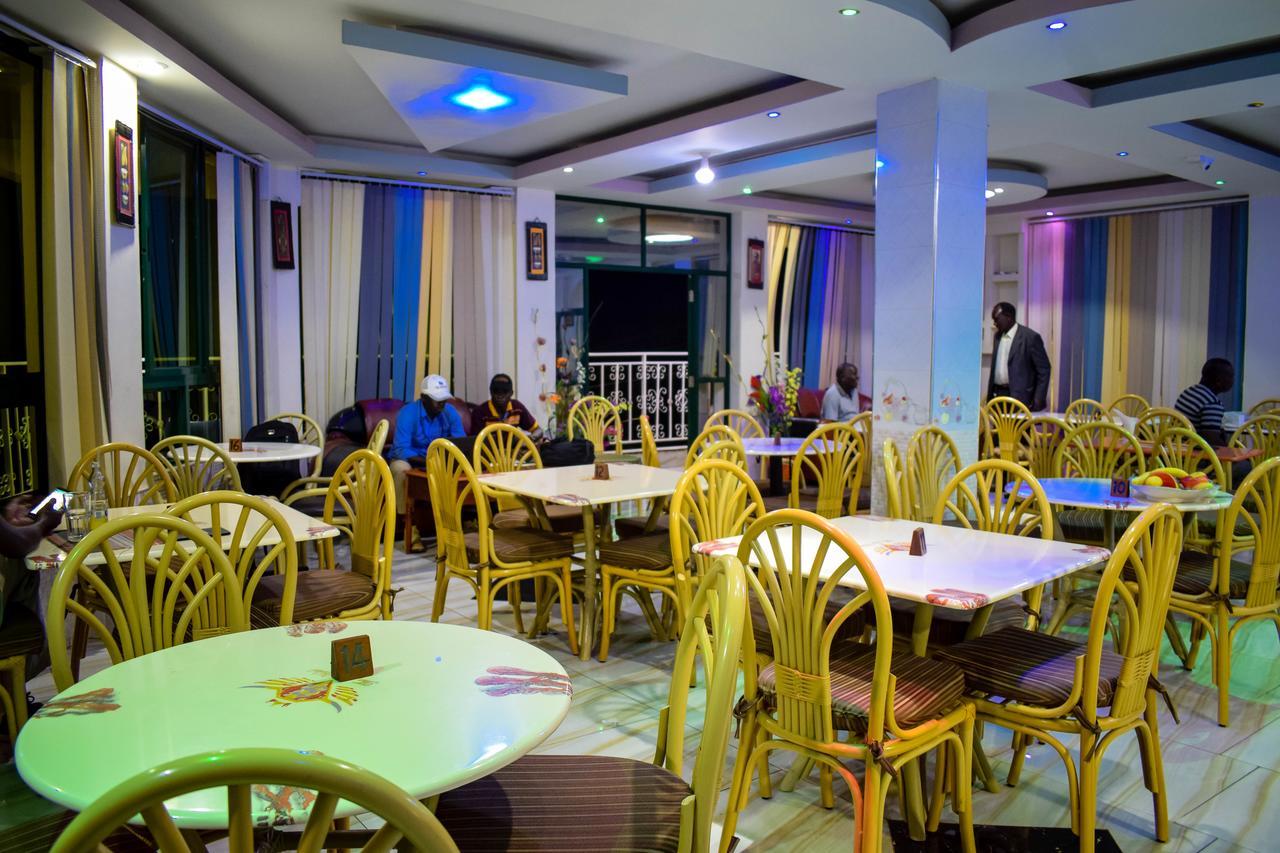 The Joy Hotel Voi Exterior photo