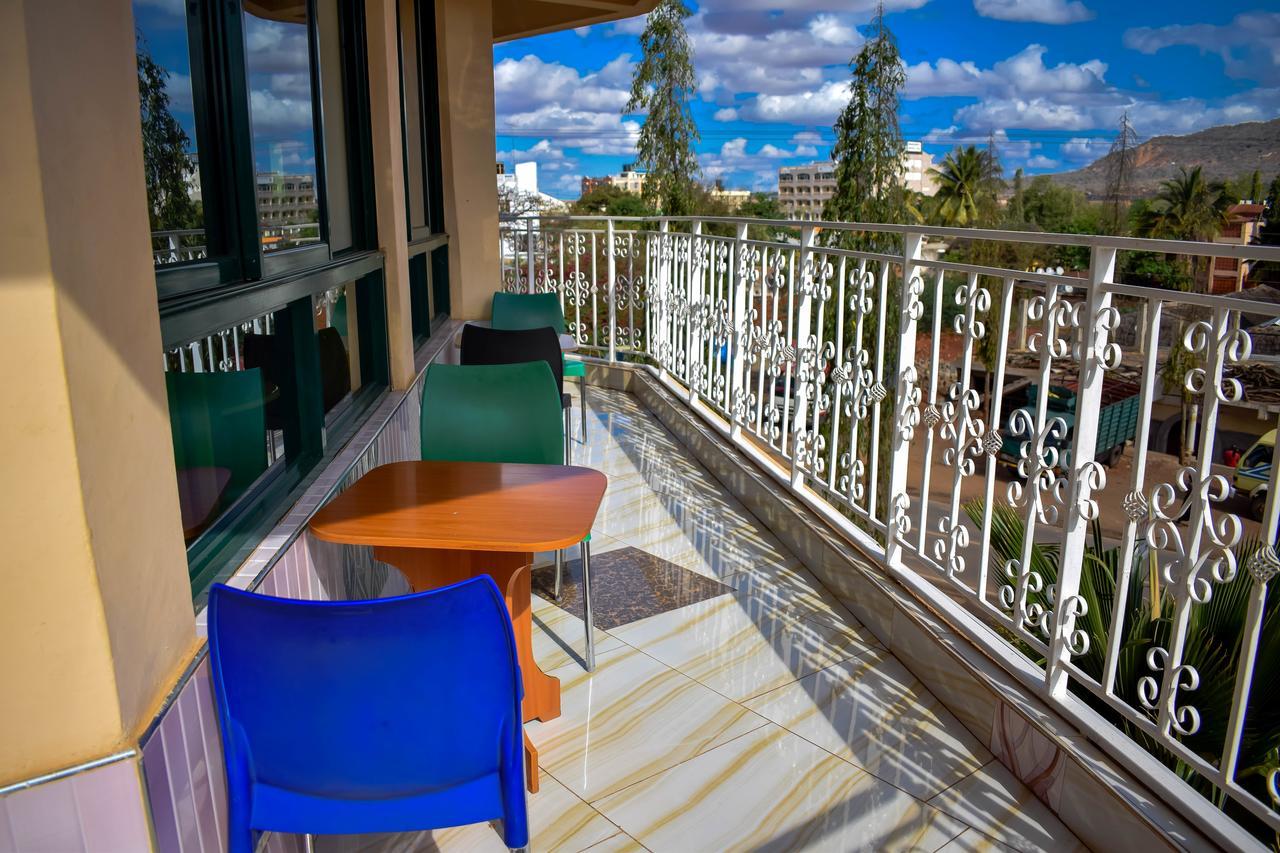The Joy Hotel Voi Exterior photo