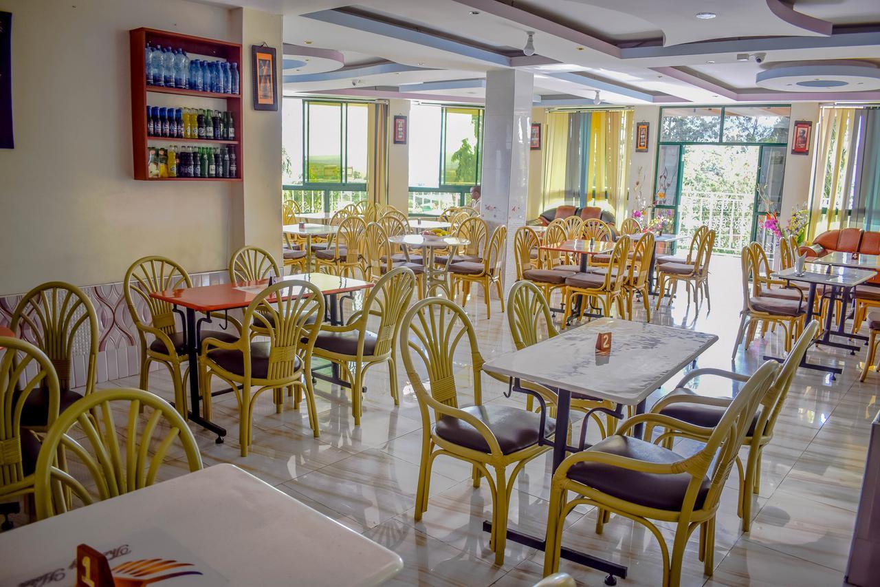 The Joy Hotel Voi Exterior photo